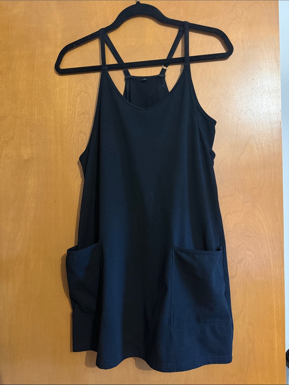 Black Pocketed Sleeveless Tunic Dress